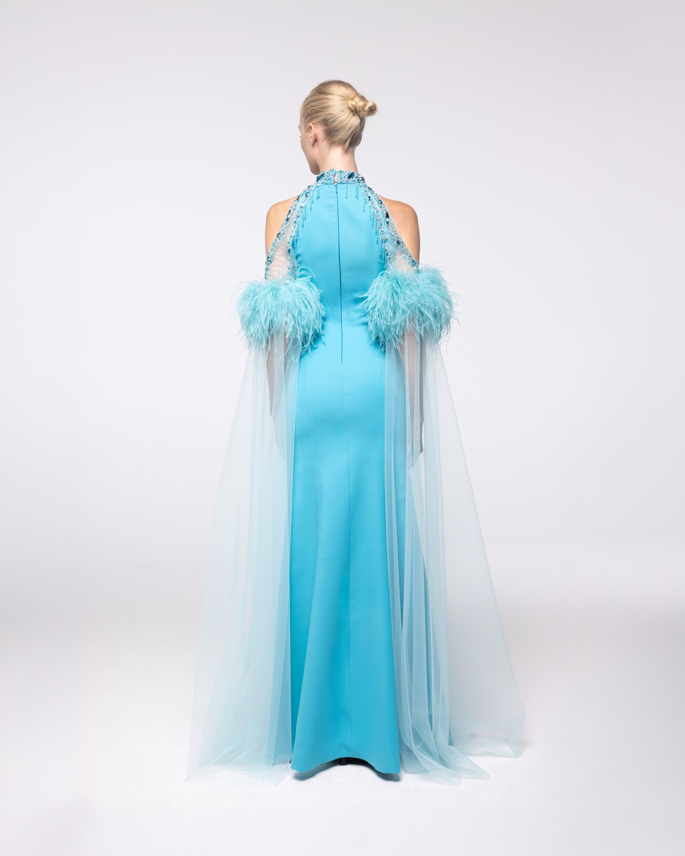 Regalia Aquamarine Feather Halter Cape Gown, back view | Helen of Troy SS27 | Maison MOOEi