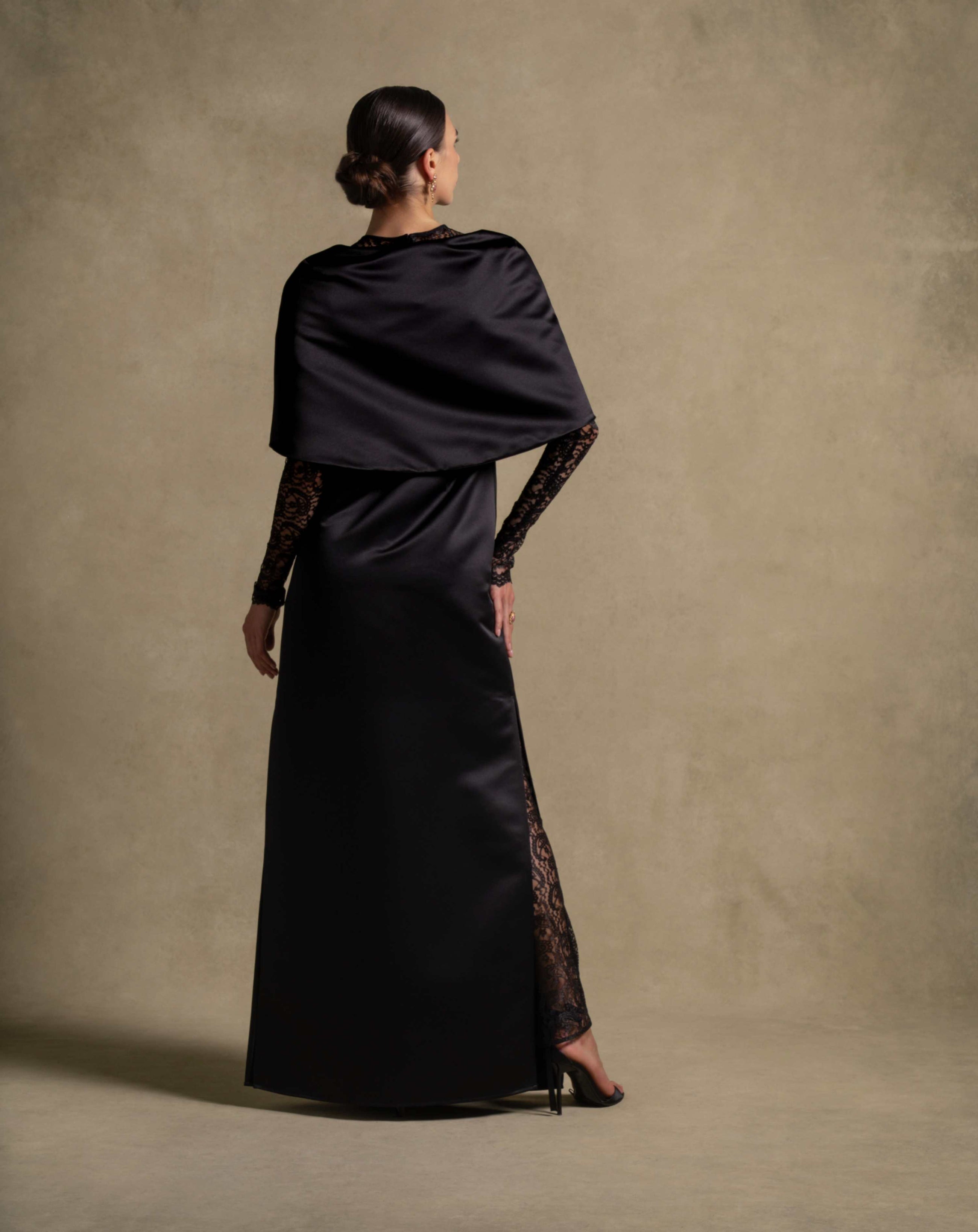 Eterna Set black gown from Zarina Collection featuring satin wrap and French lace, perfect for luxury evening wear.