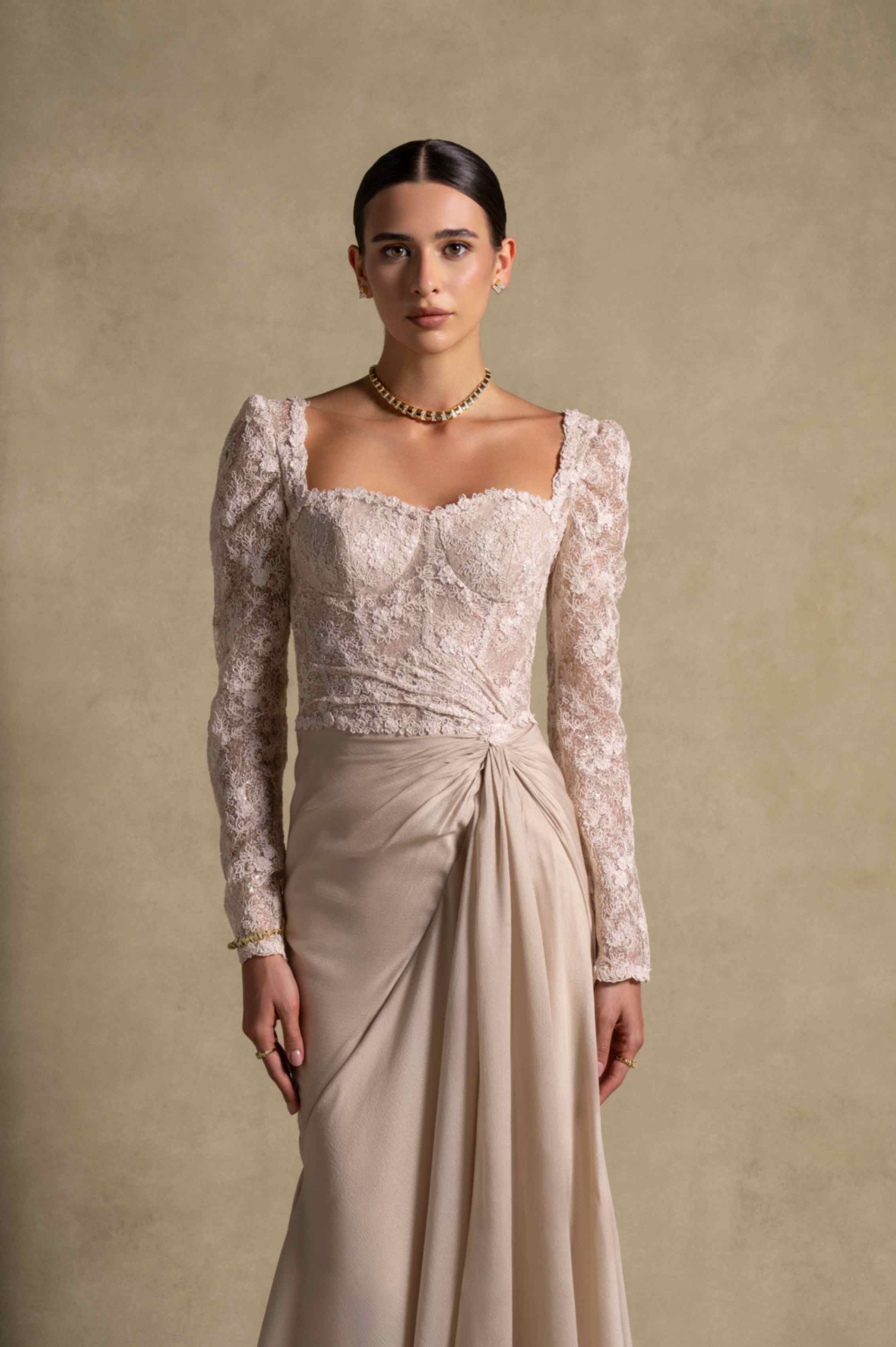 Evania Dress: elegant beige gown with lace bodice and draped chiffon skirt, perfect for luxury evening wear.
