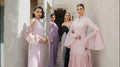 Elegant pastel gowns from the Pearl Collection SS24 in a serene setting.