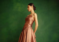 Model wearing a stunning design from Midnight mirage SS2025 collection, showcasing high-end luxury women fashion clothing.