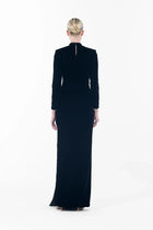 Back view of the Noir Velvet Gown with a sleek silhouette and concealed zipper, designed for elegant evening occasions.
