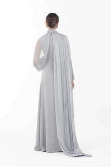 Back view of Rossettie Dress from Artista Eid - AW 2025 with long flowing chiffon cape and full-length satin gown, ideal for festive occasions.