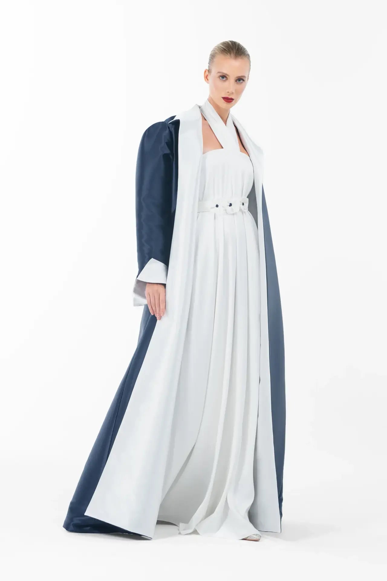 Ava Set Artista Ramadan 2025 styled with a floor-length navy coat and white gown, designed for sophisticated Eid celebrations.