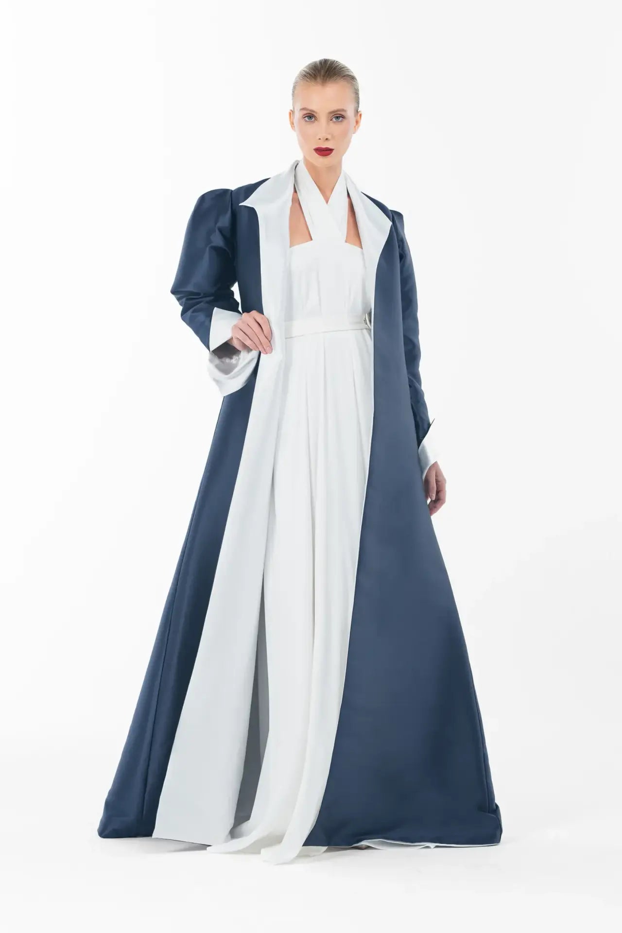 Front-facing view of Ava Set Artista Ramadan 2025 with a structured navy coat over a flowing white gown, perfect for festive wear.
