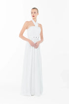 Ava Set Artista Ramadan 2025 showcasing the minimalist white halter gown without the coat, ideal for formal evening wear.