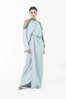 Ophelia Dress from Artista Eid - AW 2025 with flowing silhouette, gathered waist, and beaded neckline, styled for Ramadan elegance.