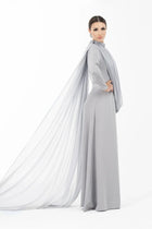 Side view of Rossettie Dress - Ramadan Collection | Satin, Chiffon Gown showcasing the graceful silhouette and extended chiffon cape detail.