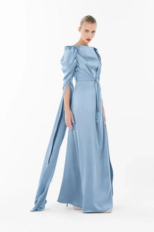 Side view of Cinderella Dress - Elegant Gown featuring flowing satin fabric, ruched long sleeves, and a cinched twisted waist for formal occasions.
