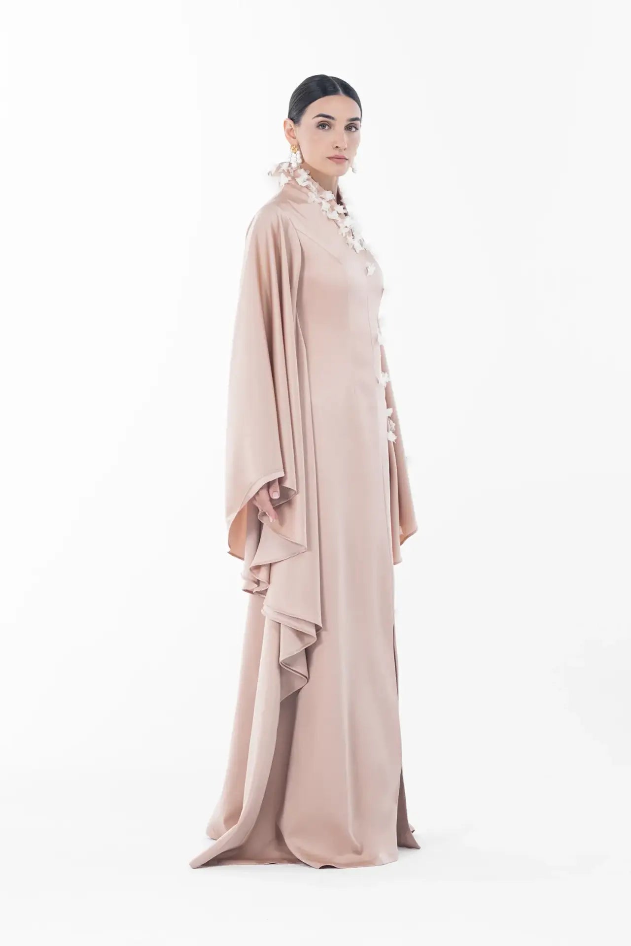 Profile view of Artista Allure Dress showcasing elegant silhouette and cascading sleeve layers, ideal for festive Ramadan 2025 wear.