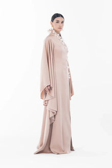 Profile view of Artista Allure Dress showcasing elegant silhouette and cascading sleeve layers, ideal for festive Ramadan 2025 wear.