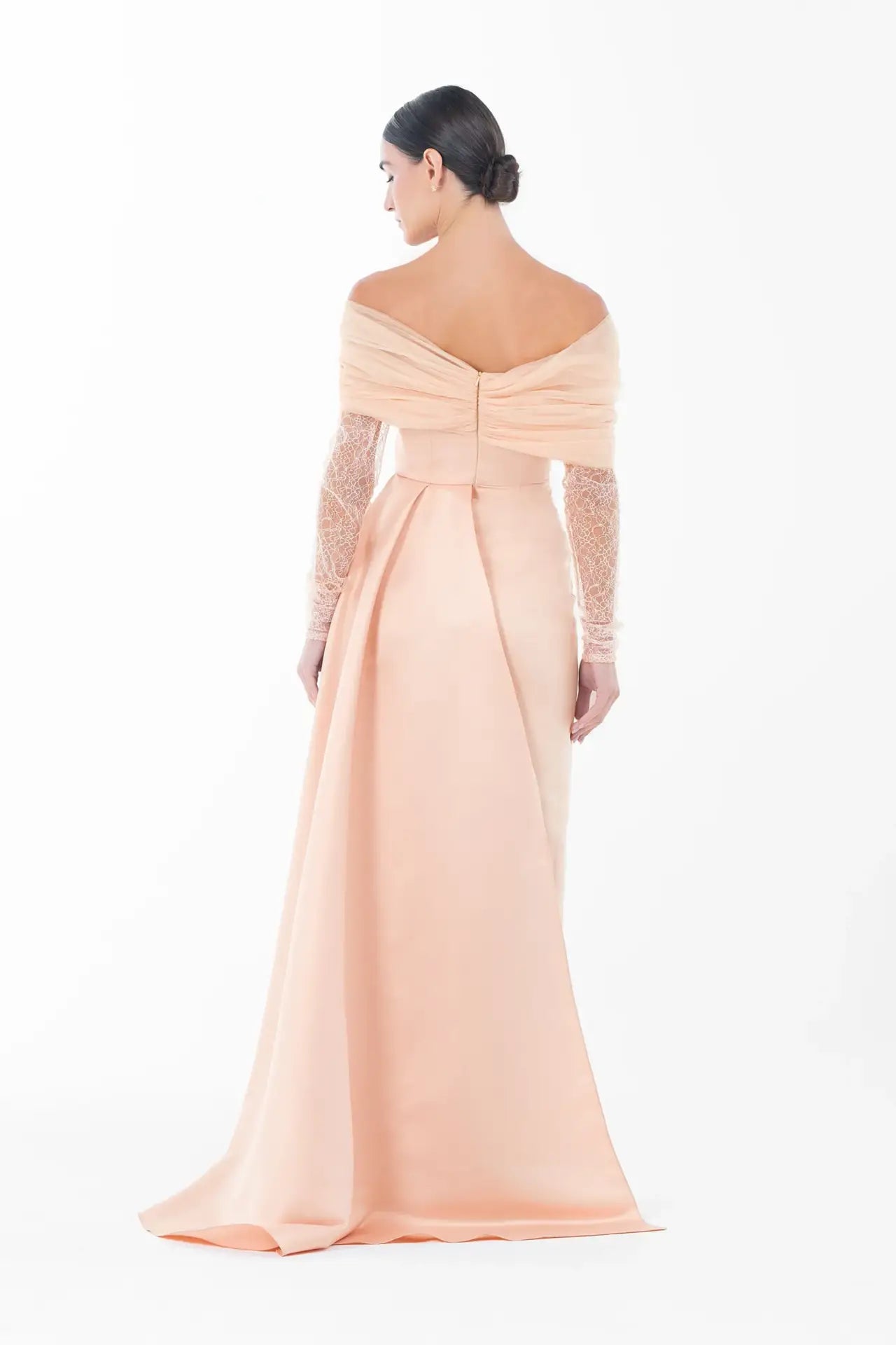 Back view of Ispahan Dress from Artista Eid - AW 2025 highlighting off-shoulder draping and long peach train, perfect for evening events.
