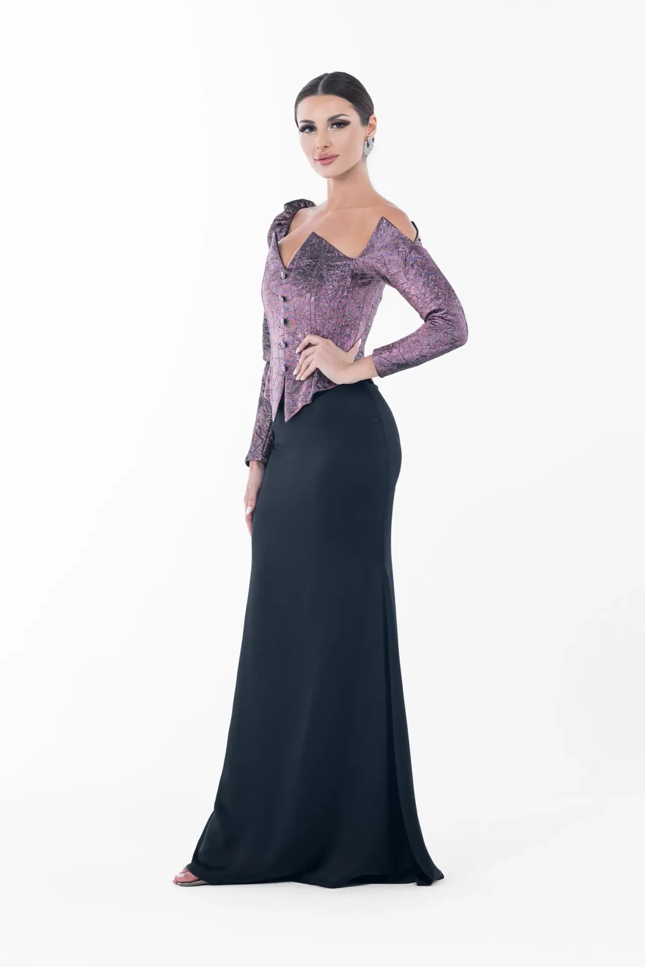 Side view of Ralphael Dress highlighting the gown's sleek black satin skirt and sculpted amethyst bodice with couture tailoring.
