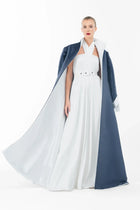 Full-length view of Ava Set Artista Ramadan 2025 with flowing white gown and structured navy coat, ideal for Eid and formal occasions.