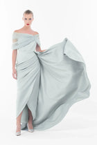 Angelina Dress from Artista Eid - AW 2025 collection with dramatic flowing tulle skirt and off-shoulder neckline, ideal for gala and evening wear.