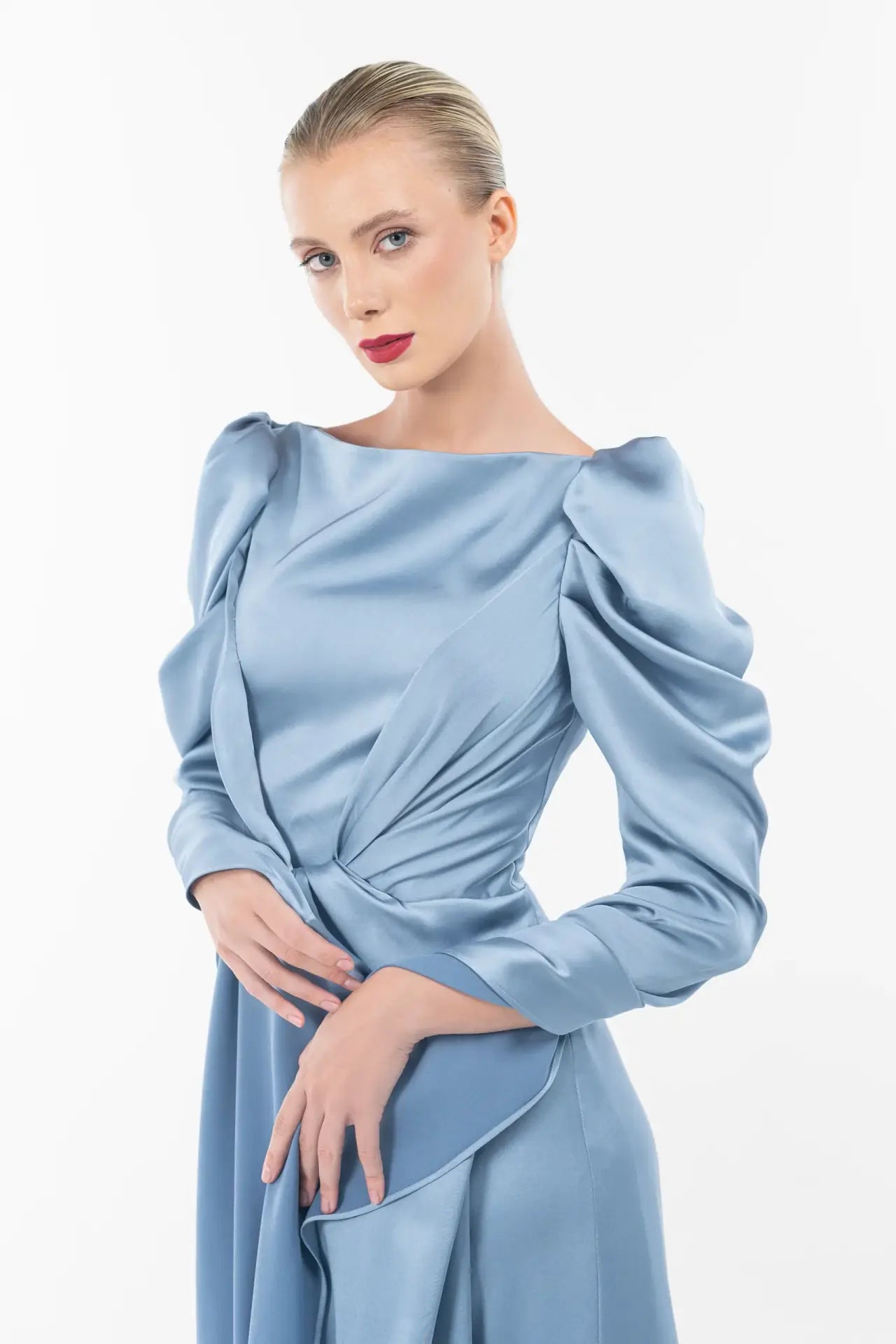 Close-up of Cinderella Dress - Elegant Gown showing detailed ruched sleeves and twisted waist in soft satin, perfect for formal wear.
