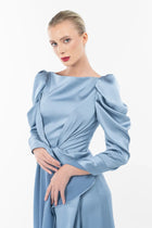Close-up of Cinderella Dress - Elegant Gown showing detailed ruched sleeves and twisted waist in soft satin, perfect for formal wear.