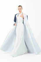 Ava Set from Artista Eid - AW 2025 collection with a flared white gown and open navy coat, styled for Ramadan elegance.