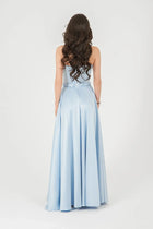 Back view of Diamond Dress Baby Blue without cape, displaying smooth satin-like fabric and full-length flared skirt for formal wear.
