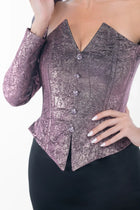 Detailed view of Ralphael Dress bodice with structured V-neckline, crystal buttons, and shimmering amethyst brocade fabric for a luxe couture look.