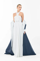 Elegant back view of Ava Set Artista Ramadan 2025 with the coat draped off the shoulders, revealing the halter gown.