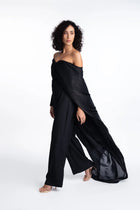 Side view of Ruby Jumpsuit - Formal Wear showcasing flowing silk organza overlay and wide-leg pants, ideal for upscale events.