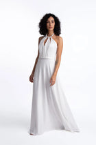 Alba Dress from Pearl Collection SS24 in a graceful pose, highlighting the elegant crepe fabric and pearl-embellished waistline.