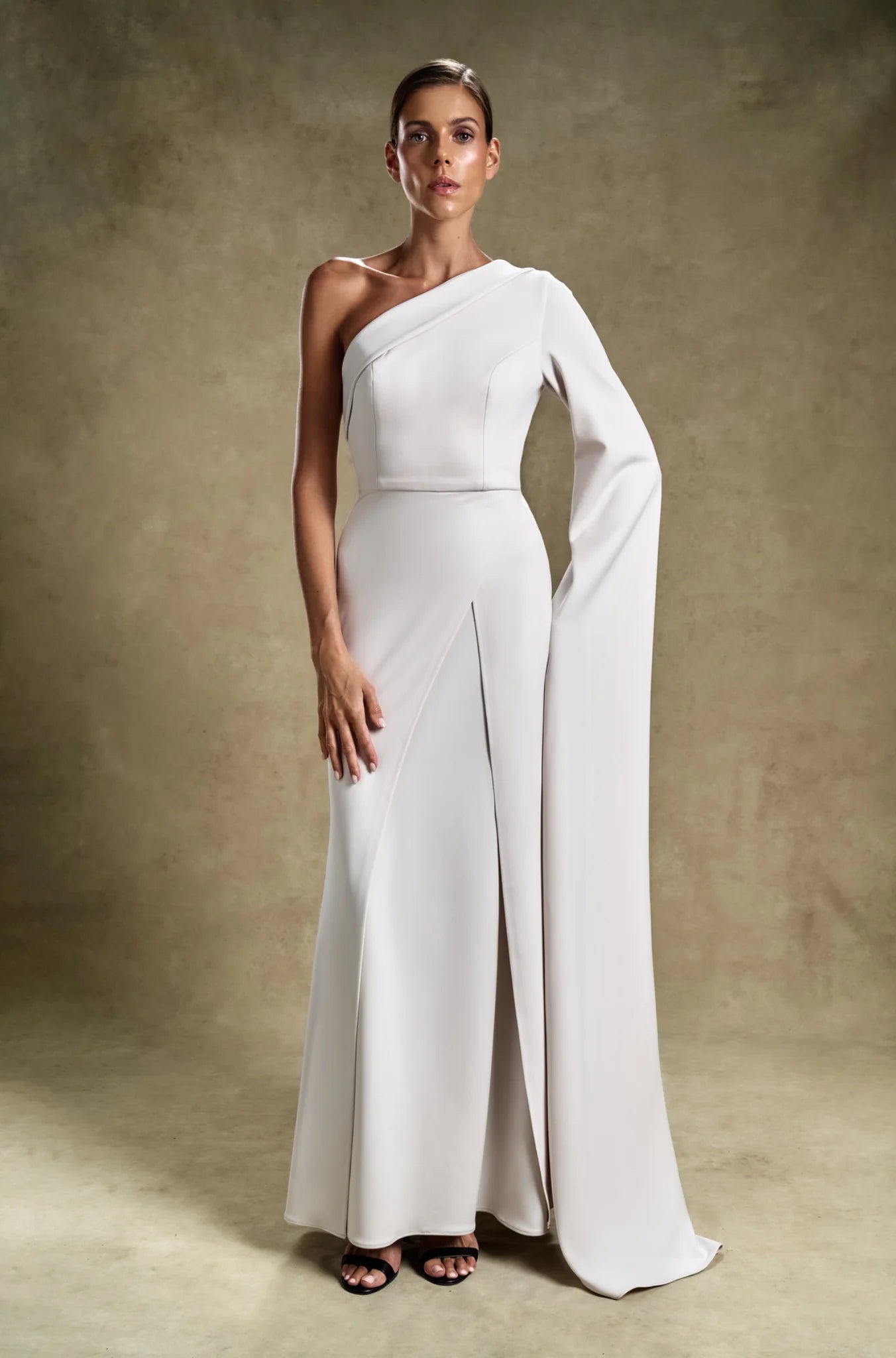 Ivory Monarch White One Shoulder Slit Gown