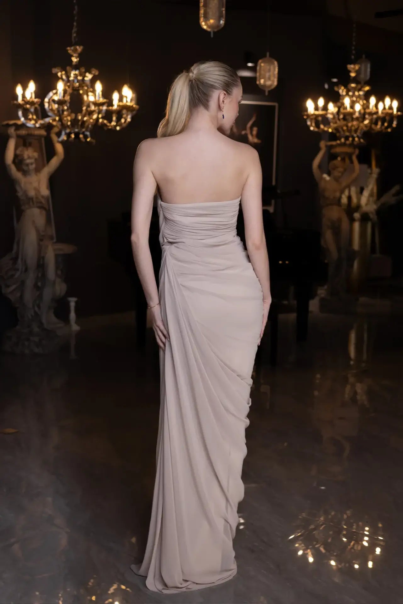 Strapless back view of Elora Dress - Beige Chiffon Elegance revealing the fitted silhouette and soft draping, perfect for evening elegance.