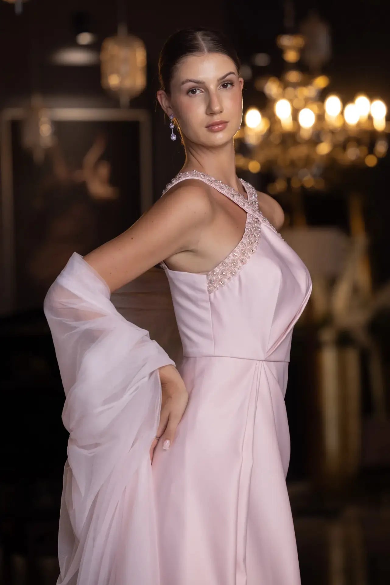 Close-up of Lily Set - Blush Pink Taffeta Gown showing crystal-trimmed cross neckline and soft satin texture for refined elegance.