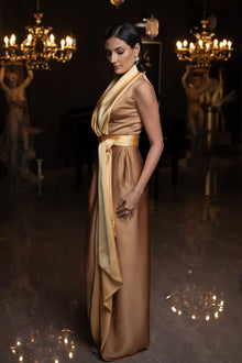 Side view of Kelly Set dress in golden mustard satin with draped neckline and belted waist, perfect for elegant events.