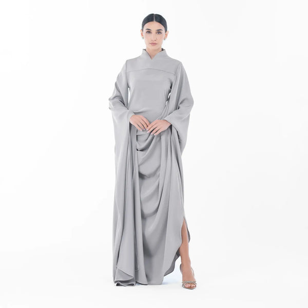 Oyster Dress in light grey satin, featuring high-neck and voluminous draping, ideal for evening wear and luxury fashion.