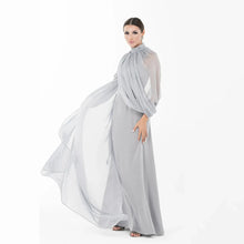 Rossettie Dress - Ramadan Collection | Satin, Chiffon Gown in soft grey with flowing chiffon overlay and high-neck design, ideal for Eid events.