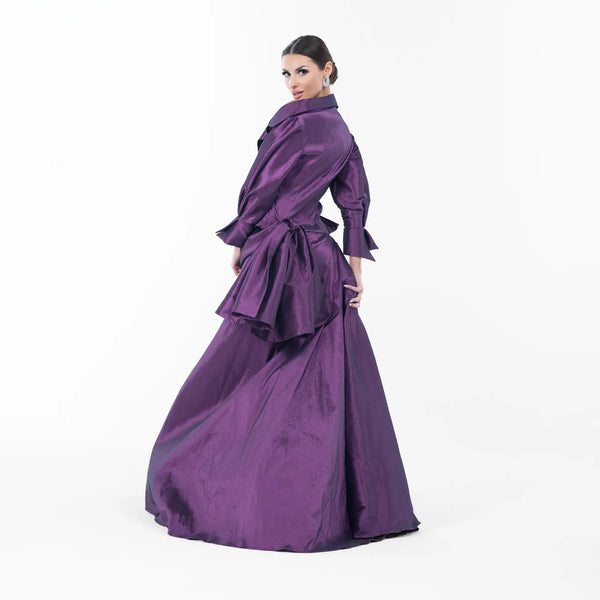 Dolce Dress showcasing a luxurious purple and black taffeta evening gown with a structured jacket and oversized bow.