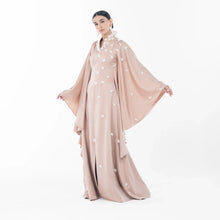 Artista Allure Dress - Ramadan 2025 high-neck blush beige gown with flowing sleeves and 3D floral embellishments, ideal for Eid celebrations.