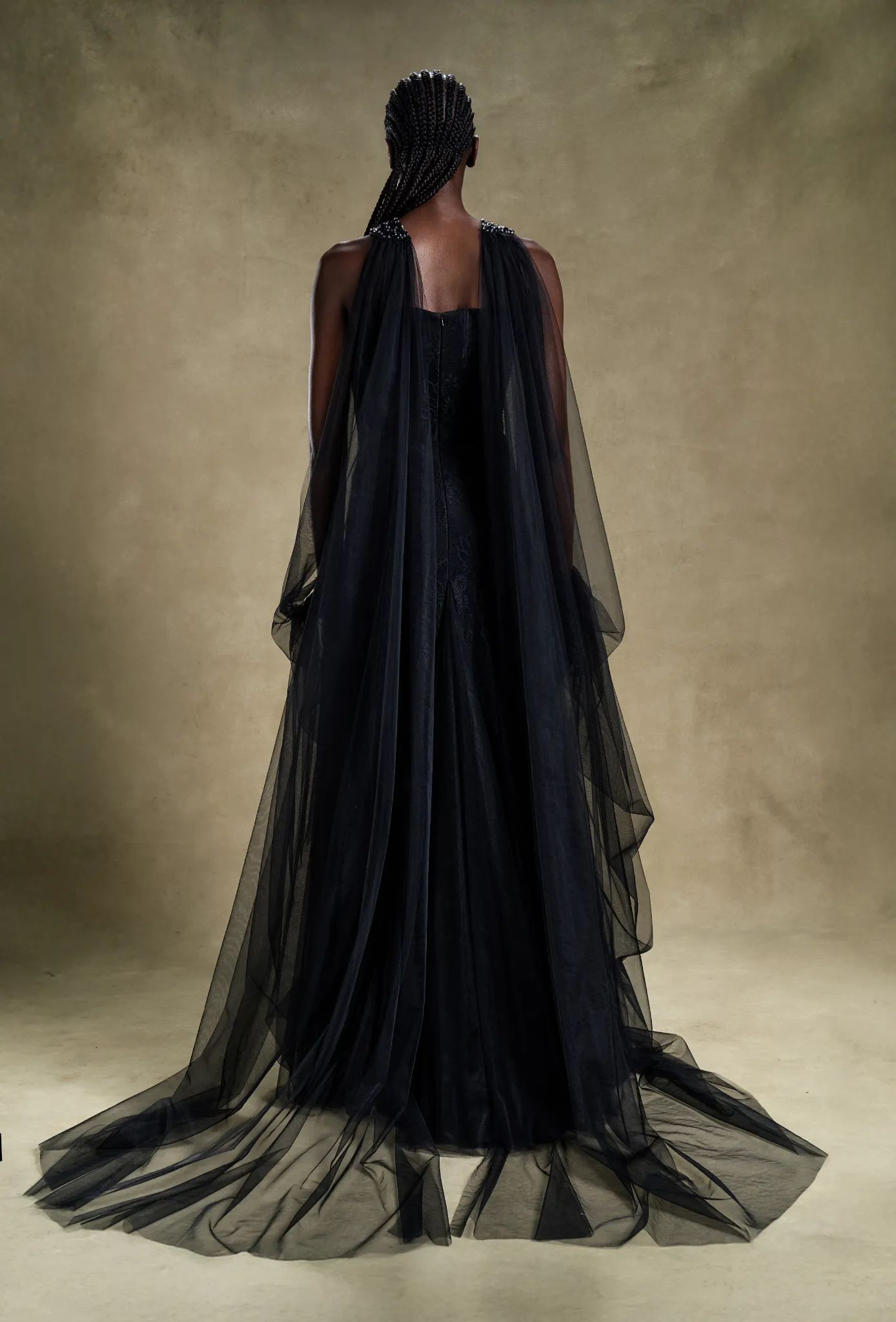 Obsidian Elegance Black Strapless Bodice Sheer Draped Sleeve Gown Obsidian Elegance Black Strapless Bodice Sheer Draped Sleeve Gown