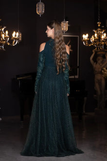 Rear view of the Pochette Dress - Emerald Green | Structured Silhouette with full-length lace skirt and open shoulders from PF2025 collection.