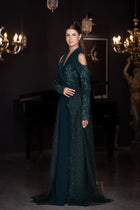 Side profile of the Pochette Dress - Emerald Green | Structured Silhouette, showcasing detailed embroidery and elegant fit from PF2025 line.