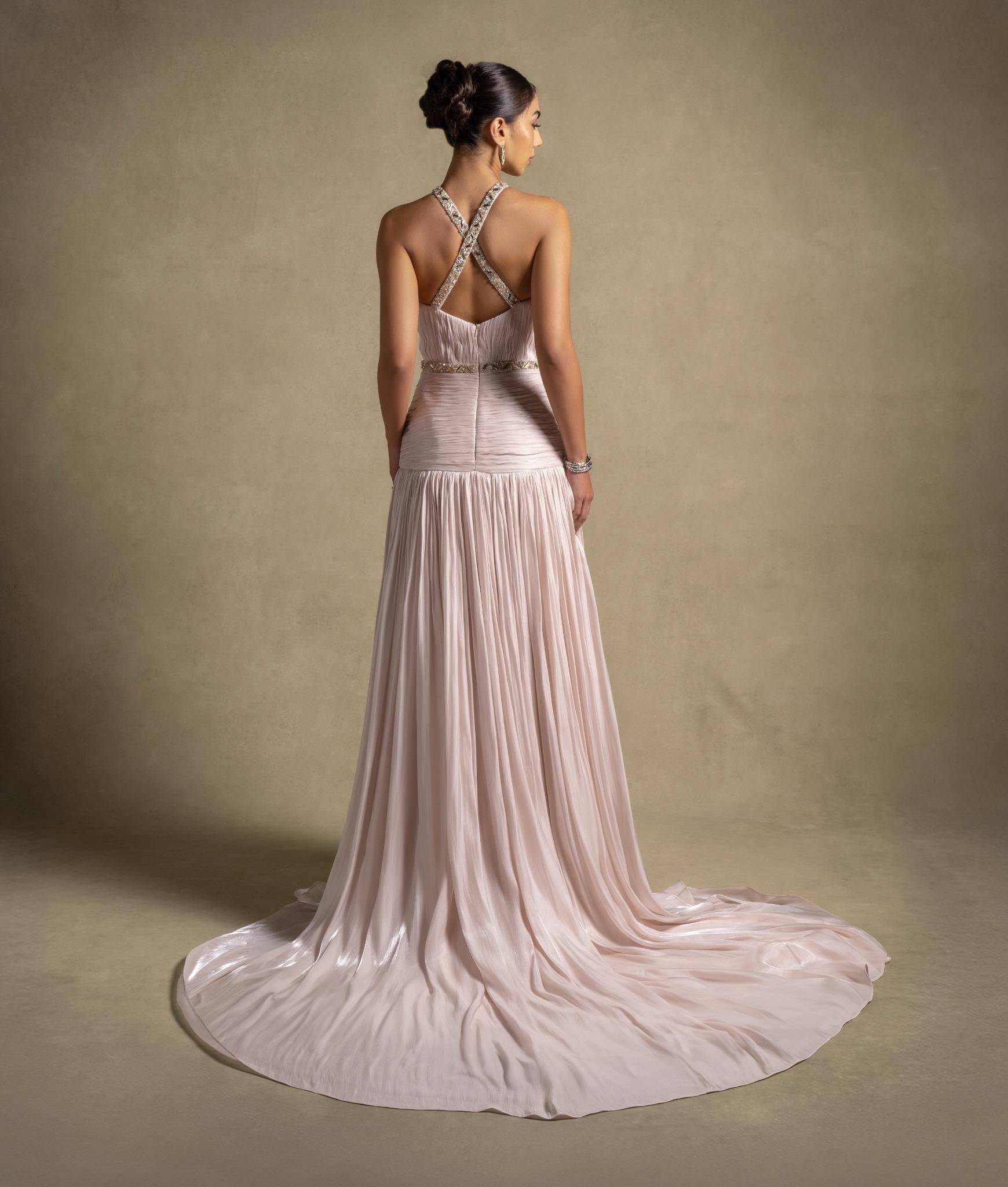 Avelisse Dress showcasing the elegant back with intricate beading and soft drape, perfect for luxury evening wear.