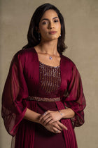 Burgaya Dress featuring a beaded neckline and pleated chiffon overlay, perfect for evening wear and high end fashion.