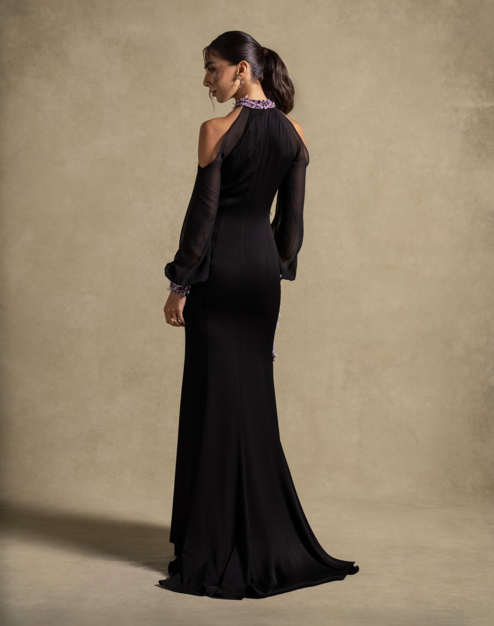 Luna Set black gown with cold-shoulder cut, sheer sleeves, luxury evening wear, high end fashion for women.