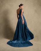 Layali Dress in turquoise, showcasing a one-shoulder design and flowing train, ideal for luxury evening wear.
