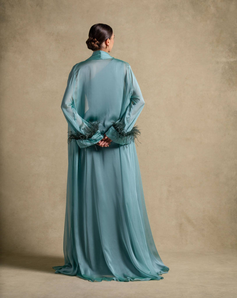 Blanche Set elegant maxi dress in teal chiffon with feather trim, showcasing luxury ready-to-wear fashion for women.