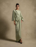 Renee Dress in pistachio, a luxury maxi dress with embellished neckline and fluid sleeves, perfect for evening wear.