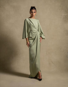 Renee Dress in pistachio, a luxury maxi dress with embellished neckline and fluid sleeves, perfect for evening wear.