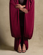 Vionna Dress in deep maroon showcasing elegance with draped jersey, perfect for high-end fashion and evening wear.