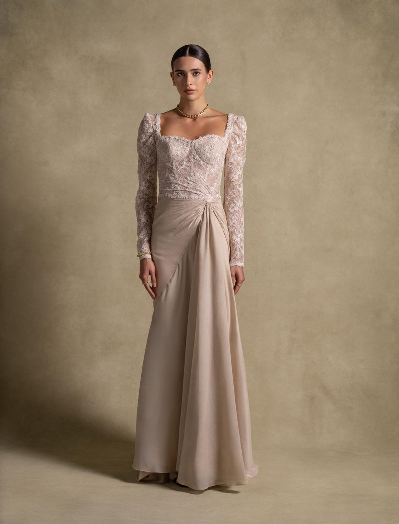 Evania Dress from Zarina Collection, a luxury beige gown with lace bodice and chiffon skirt, perfect evening wear.