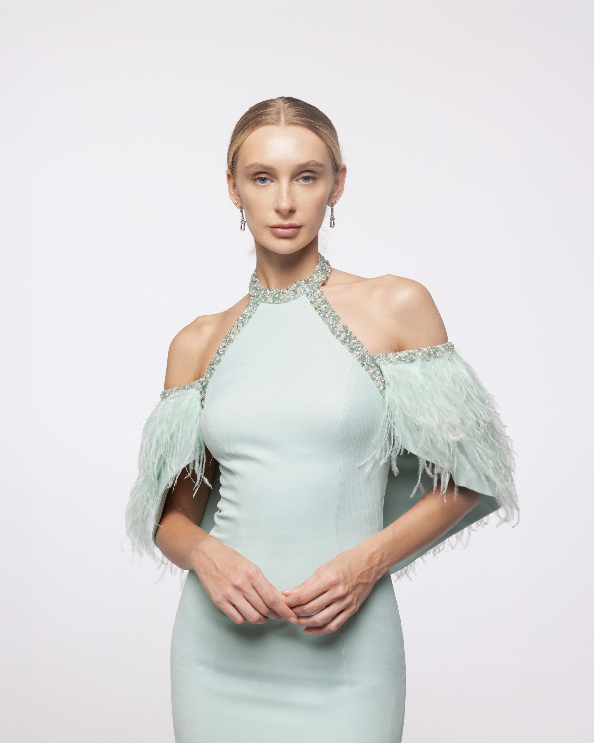 Iris Mint Green Feather Sleeve Halter Gown, close up detail | Helen of Troy SS27 | Maison MOOEi