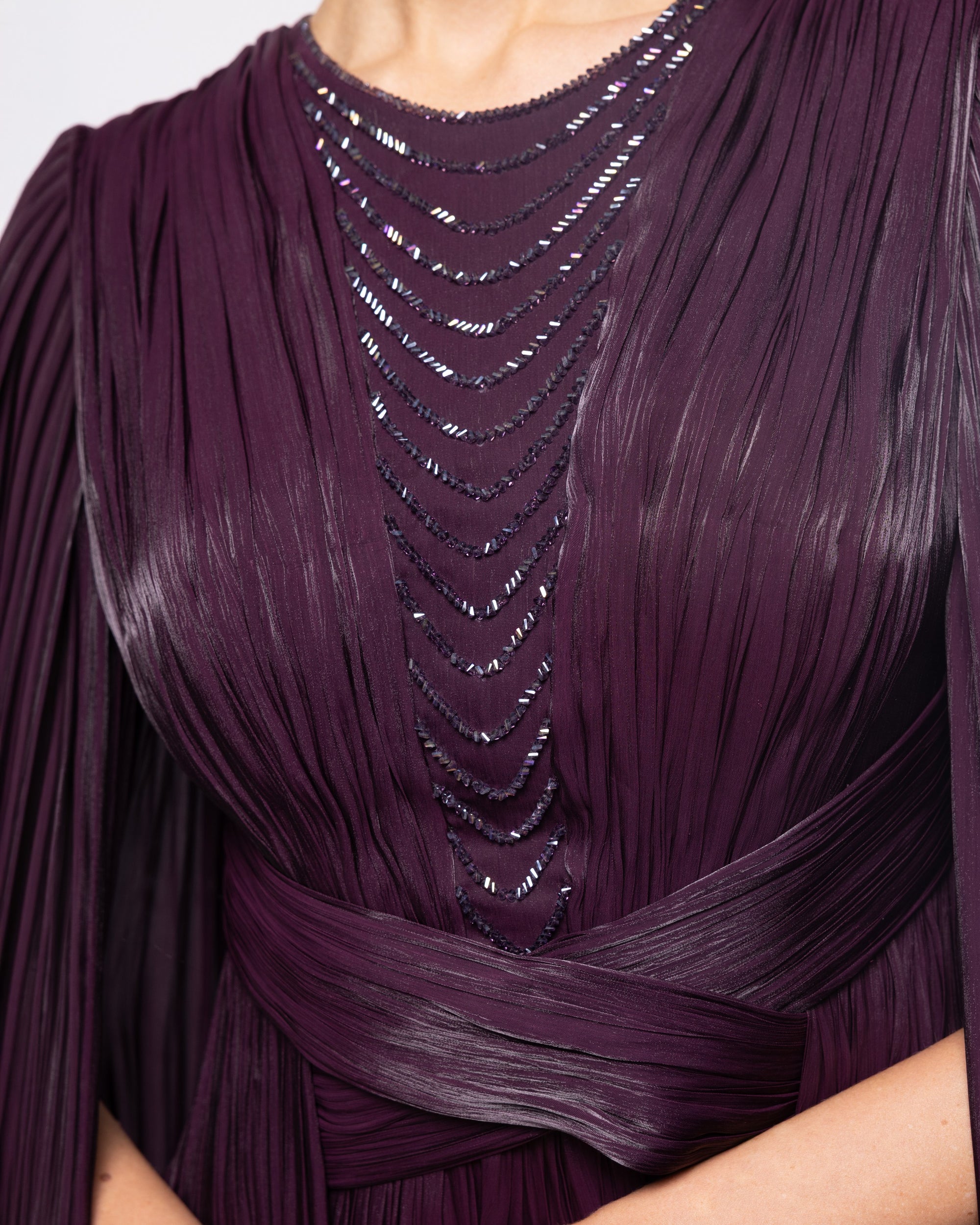 Persephone Aubergine Pleated Cape Sleeve Gown, close up detail | Helen of Troy SS27 | Maison MOOEi