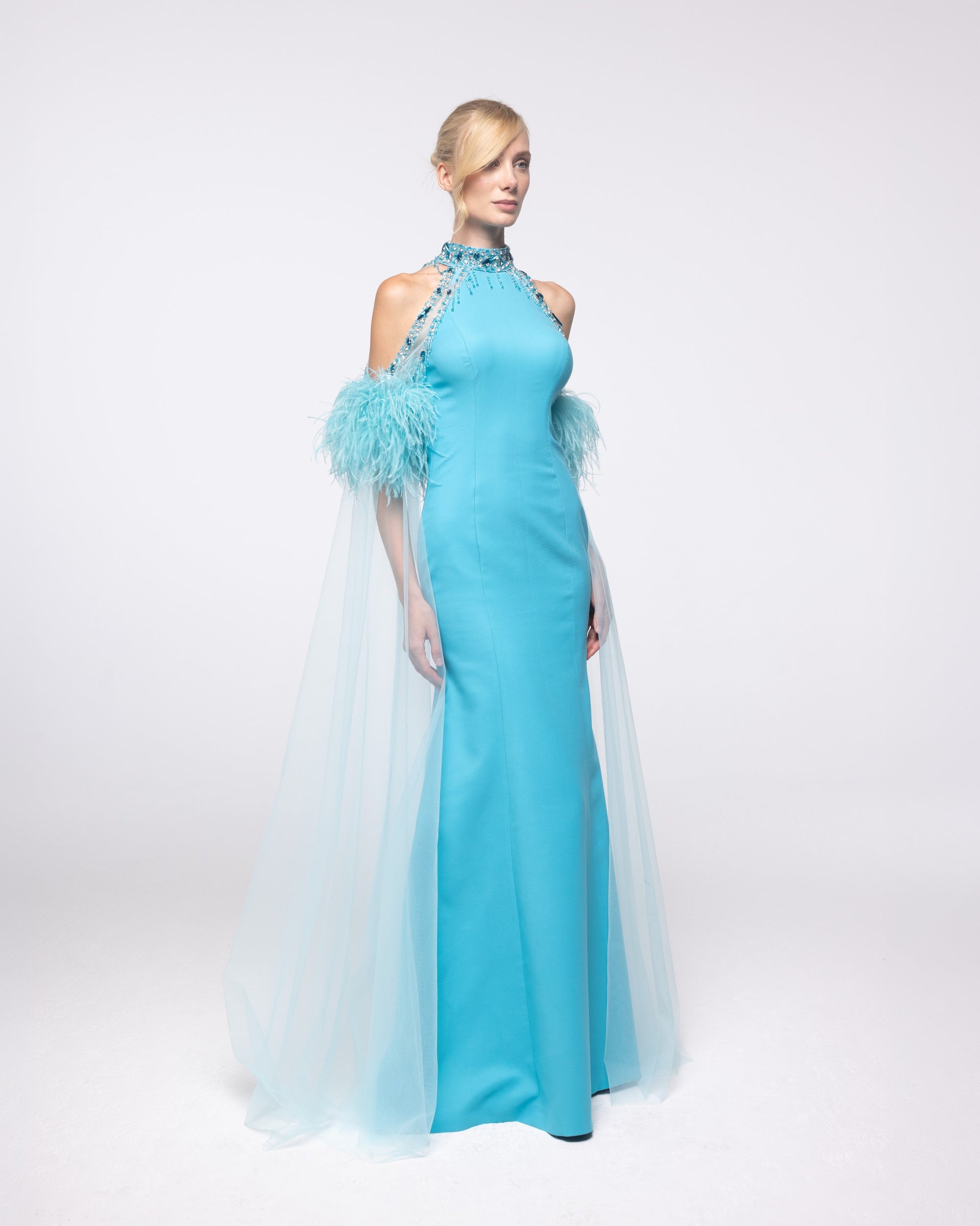 Calypso Aquamarine Feather Halter Cape Gown
